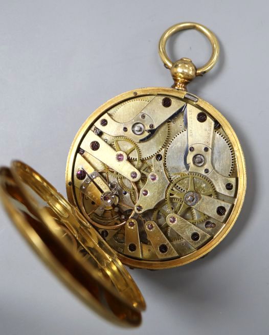 A continental engine turned 18k yellow metal open face keywind pocket watch, with Roman dial, diameter 46mm, gross 58.4 grams.
